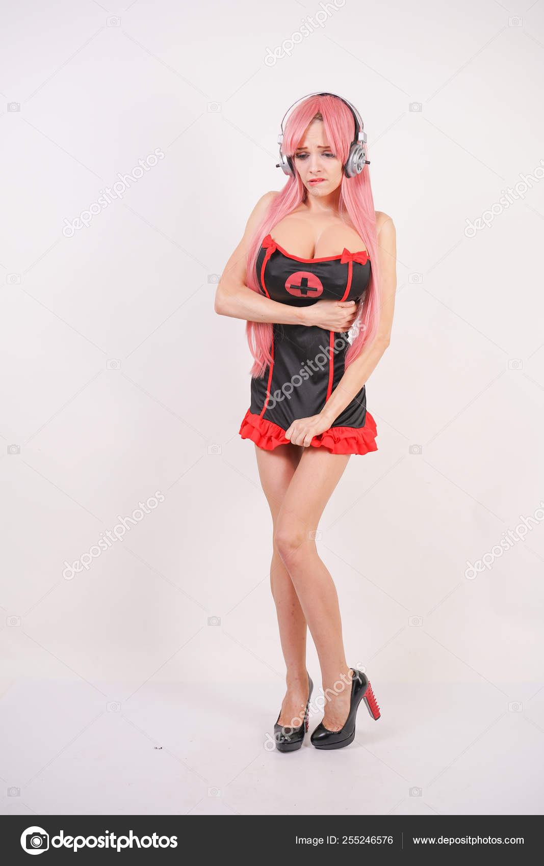Cute Young Girl Pink Long Hair Black Red Sex Nurse Stock Photo by ©agnadevi 255246576