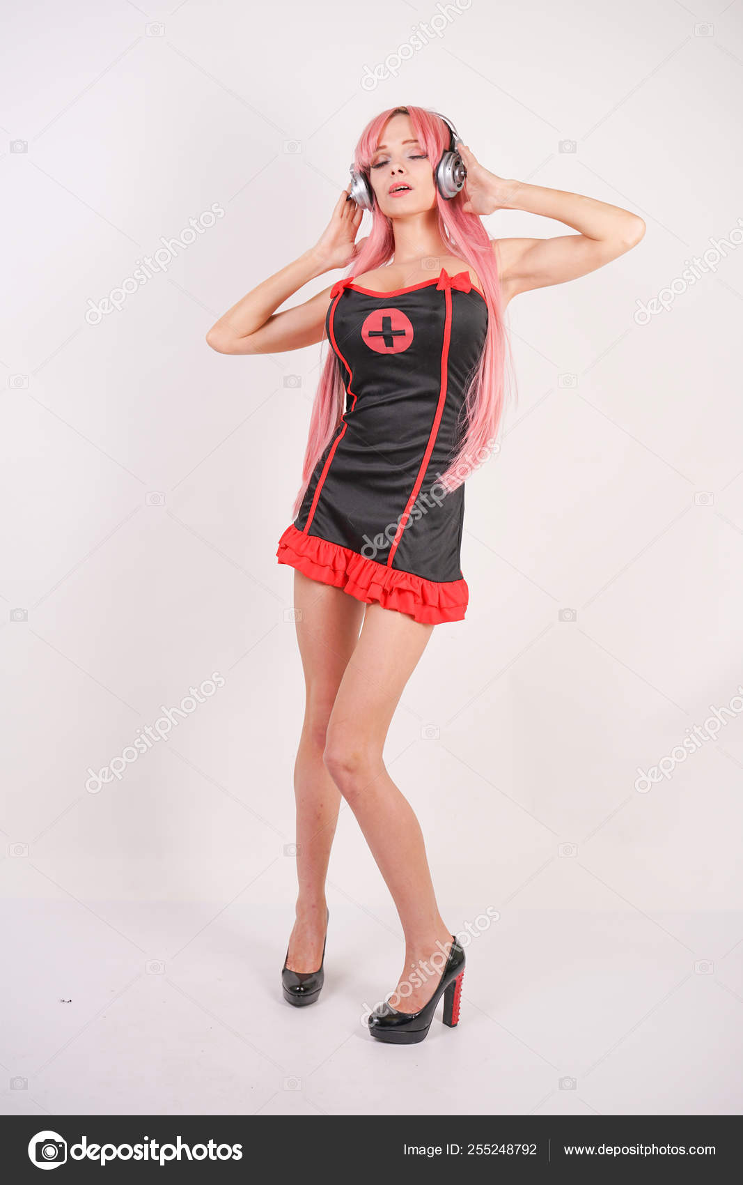 Cute Young Girl Pink Long Hair Black Red Sex Nurse Stock Photo by ©agnadevi 255248792