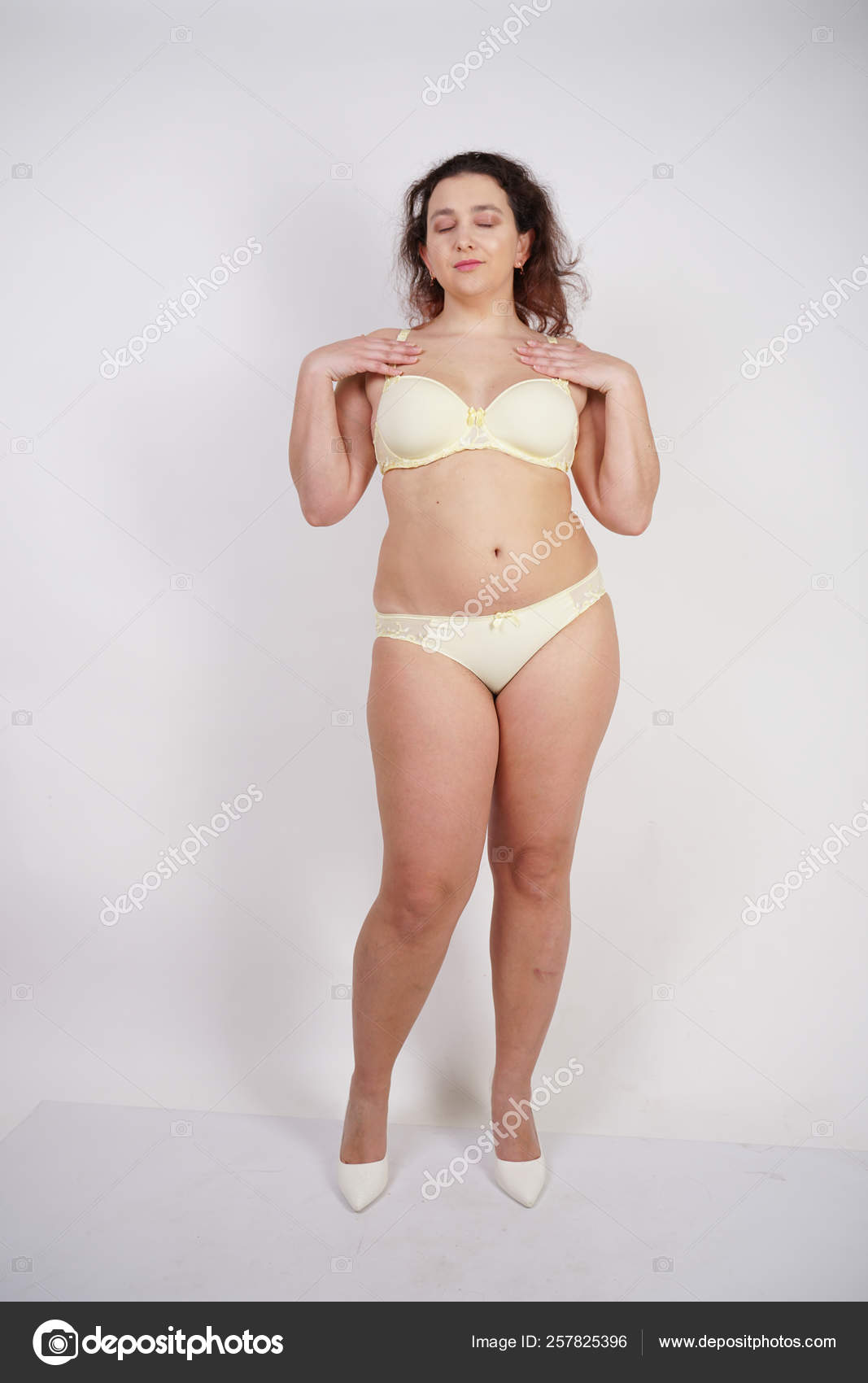 Pretty Chubby Girl Wearing Fashionable Yellow Underwear Loves Her Body Stock  Photo by ©agnadevi 257825396
