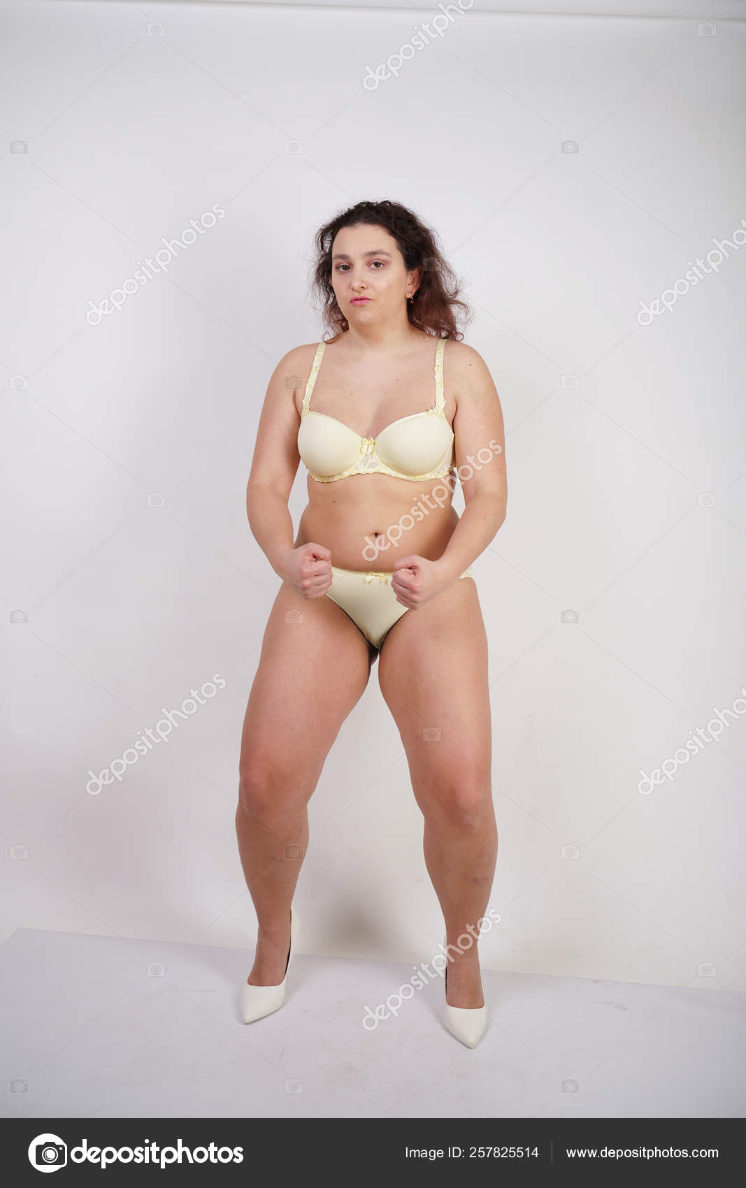 Pretty Chubby Girl Wearing Fashionable Yellow Underwear Loves Her Body  Stock Photo by ©agnadevi 257825514