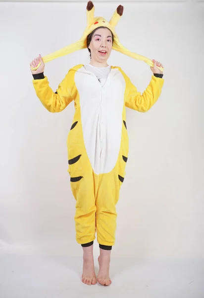 Funny Cheerful Girl Big Yellow Pajamas Kigurumi Posing White Background — Stock Photo, Image