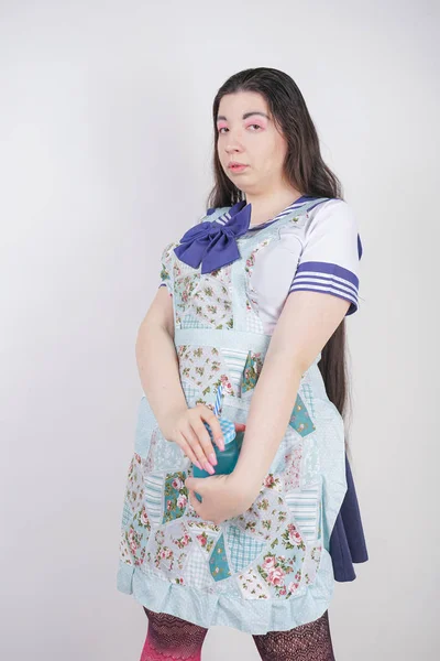 charming plus size anime girl in school uniform and an apron on top with a blue can of drink on white background