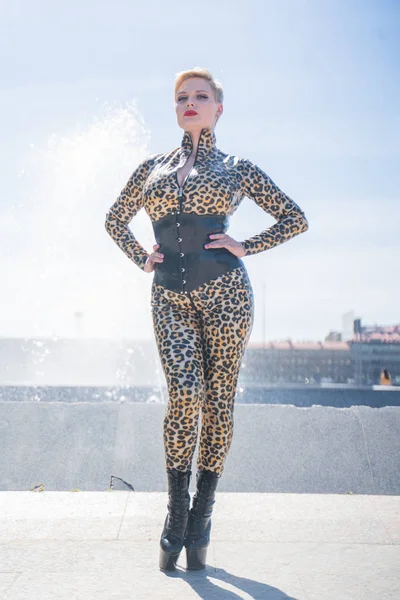 Young Plus Size Adult Girl In Black Spandex Catsuit With Tiger Pattern  Walking In The Old City Stock Photo, Picture and Royalty Free Image. Image  135780925.