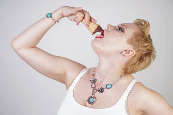 Pretty Caucasian Blonde Short Hair Girl Eating Tasty Ice Cream Stock Image
