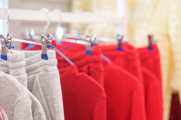 Fashionable Clothes Hanging Hangers Store Nobody — Stock Photo, Image