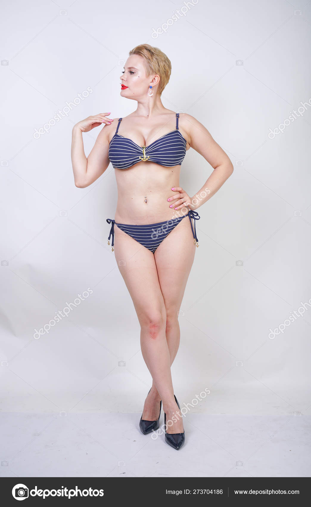 Beautiful Curvy Caucasian Girl Big Breasts Striped Swimsuit Stands White  Stock Photo by ©agnadevi 273704186
