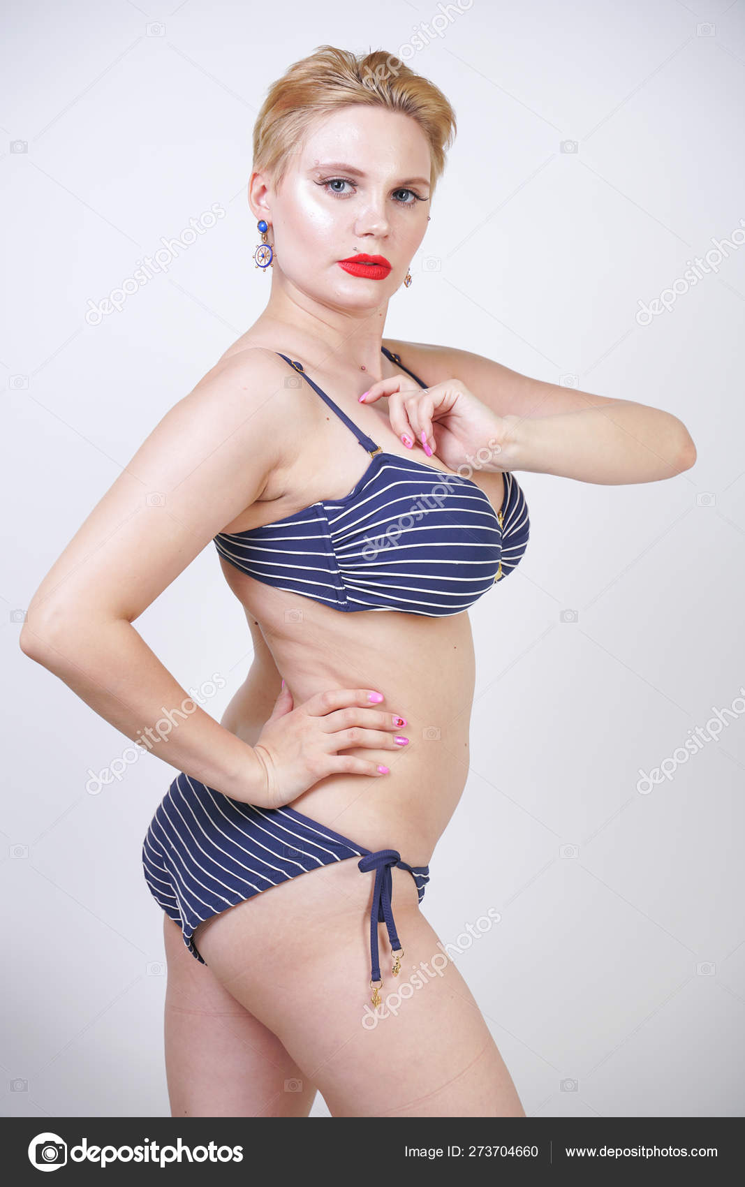 Beautiful Curvy Caucasian Girl Big Breasts Striped Swimsuit Stands White  Stock Photo by ©agnadevi 273704660