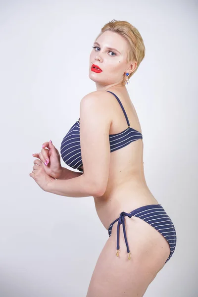 Beautiful Curvy Caucasian Girl Big Breasts Striped Swimsuit Stands