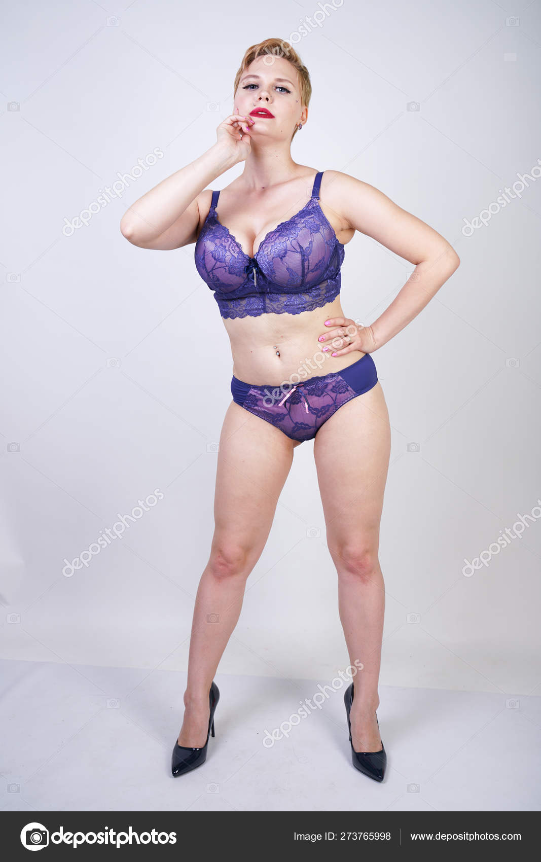 Sexy Size Girl Short Hair Purple Lingerie White Background Studio
