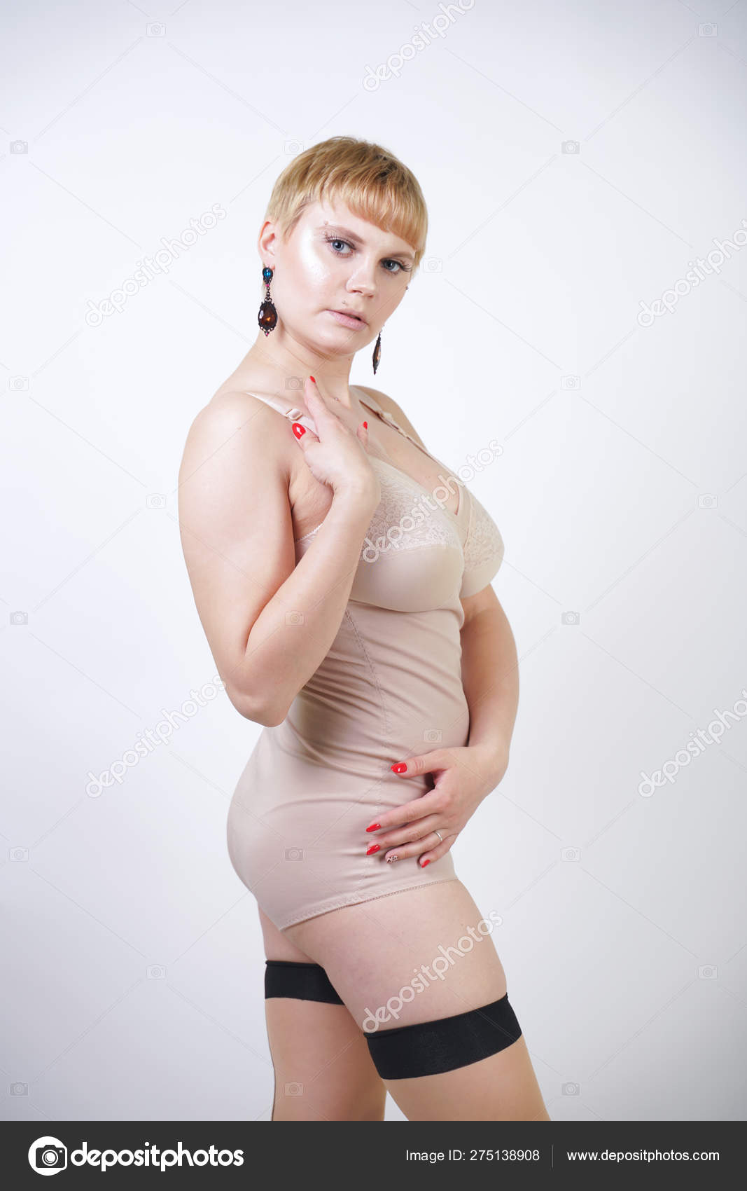 Pretty Blonde Short Hair Retro Woman Curvy Body Posing Beige Stock Photo by ©agnadevi 275138908 photo picture