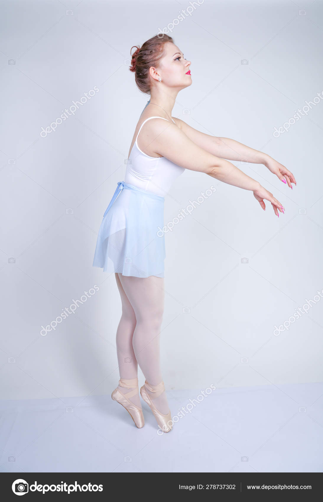 Cute Caucasian Ballet Clothes Learning Ballerina White Studio Stock Photo by ©agnadevi