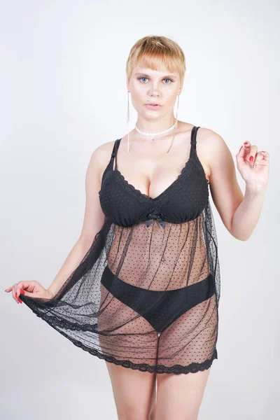 Young beautiful caucasian plus size model in underwear — Stock Photo, Image