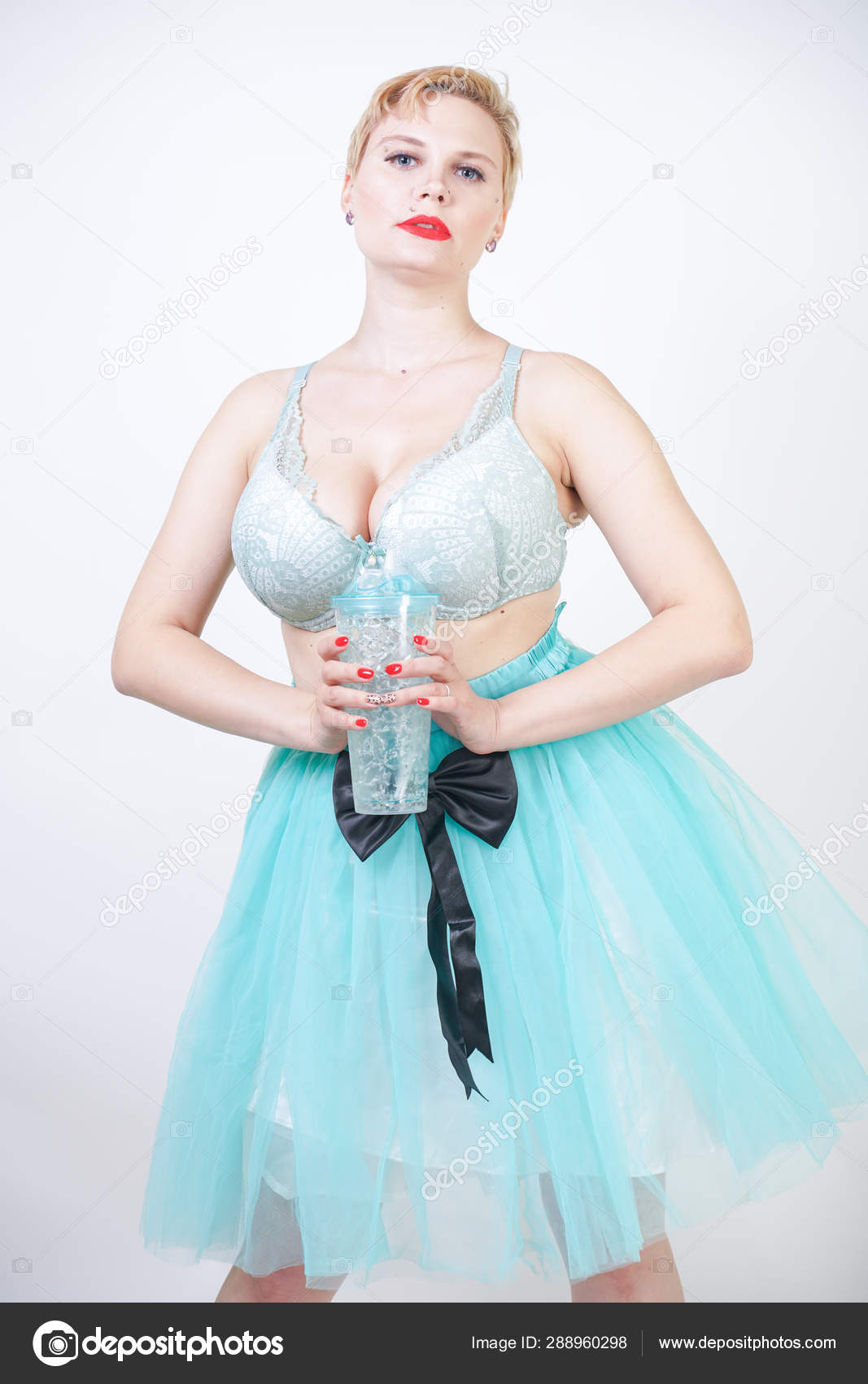 Plus Size Woman With Short Hair Wear Bra And Tutu Skirt Stock