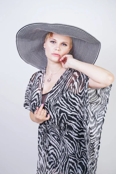 Attractive pretty woman wearing zebra dress in studio — Stock Photo, Image