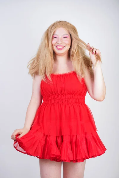Plus size asian fashion model in red dress — Stock Photo, Image