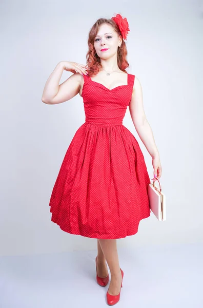 Beautiful girl in pinup style dress isolated on white — Stock Photo, Image
