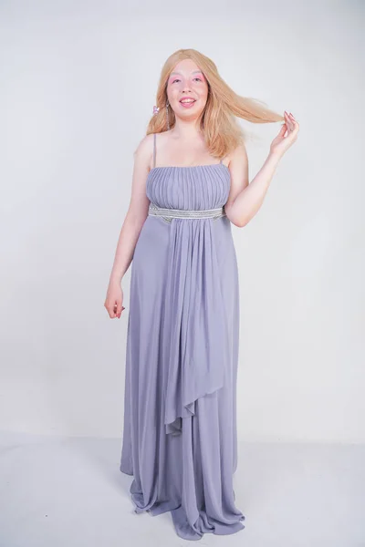 Young mix race happy adult woman in a grey long shiffon evening wear — Stock Photo, Image