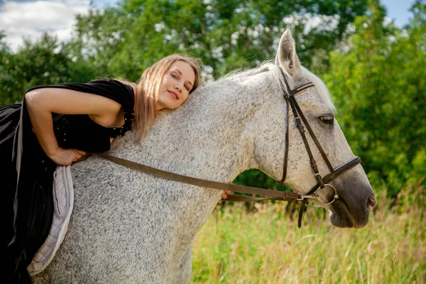 Young beautiful woman with horse — Stock Photo © BestPhotoStudio #6084854