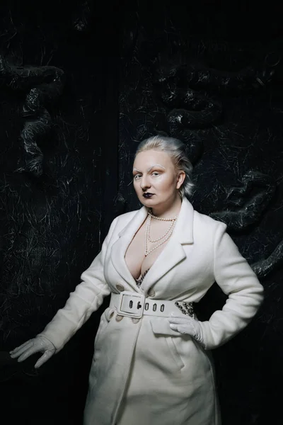 Portrait of unusual girl in white clothes on black background in the Studio. woman plus size albino. concept of beauty in any person — Stock Photo, Image