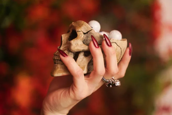 skull with candy in the form of human eyes. Halloween concept