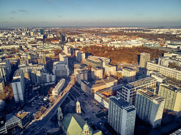 Beautiful panoramic aerial skyline drone view to the skyscrapers located center of Warsaw City, Poland