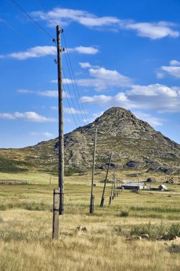 Beautiful panoramic summer steppe landscape of stone mountains 