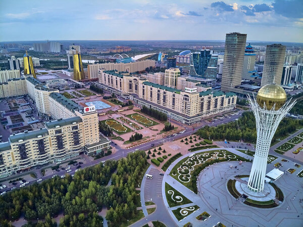 NUR-SULTAN, KAZAKHSTAN - July 29: Beautiful panoramic aerial drone view to Nur-Sultan or Nursultan (Astana) city center with skyscrapers and Baiterek Tower, Kazakhstan (Qazaqstan)