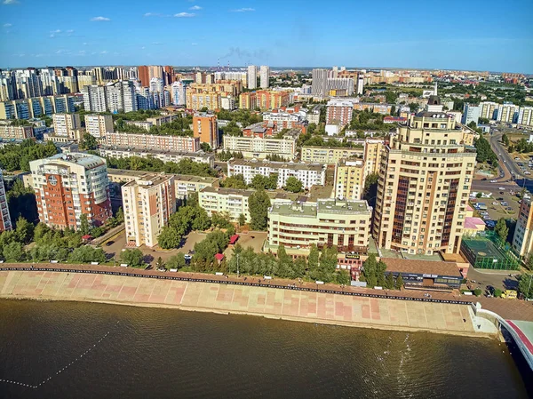 NUR-SULTAN, KAZAKHSTAN - July 30: Beautiful panoramic aerial drone view to Ishim River Embankment ??? Nur-Sultan or Nursultan (Astana) city center with skyscrapers and modern pedestrian bridge — Stock Photo, Image