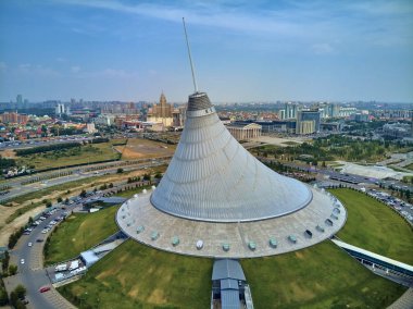 NUR-SULTAN, KAZAKHSTAN - July 29: Beautiful panoramic aerial drone view to Nur-Sultan or Nursultan (Astana) city center with skyscrapers and Khan Shatyr Entertainment Center, Kazakhstan (Qazaqstan) clipart