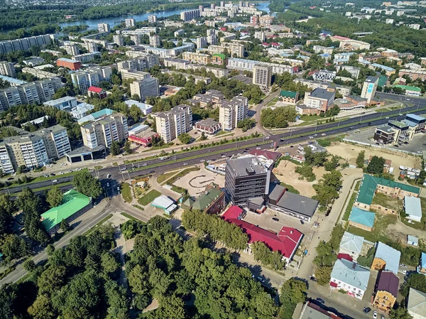 UST-KAMENOGORSK, KAZAKHSTAN - August 10: Beautiful panoramic aerial drone view to the monument to Abay Kunanbayev and akimat (city hall) on the republic square in UST-KAMENOGORSK (Oskemen), QAZAQSTAN — Stock Photo, Image