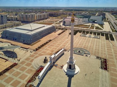 NUR-SULTAN, KAZAKHSTAN - August 11: Beautiful panoramic aerial drone view to Nursultan (Astana) city center with skyscrapers, Monument Kazakh Eli, Shabyt Palace of Creativity and Hazrat Sultan Mosque clipart