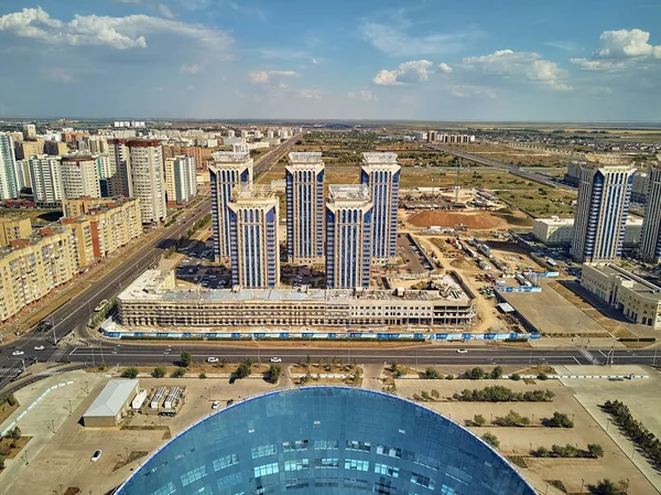 NUR-SULTAN, KAZAKHSTAN - August 11: Beautiful panoramic aerial drone view to Nursultan (Astana) city center with skyscrapers and Shabyt Palace of Creativity (National University of Arts ) — стоковое фото