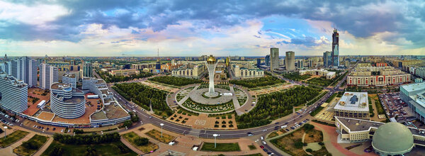 NUR-SULTAN, KAZAKHSTAN - July 29: Beautiful panoramic aerial drone view to Nur-Sultan or Nursultan (Astana) city center with skyscrapers and Baiterek Tower, Kazakhstan (Qazaqstan)