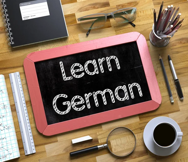 Вивчати німецьку мову, від руки на невеликий дошці. 3D. — стокове фото