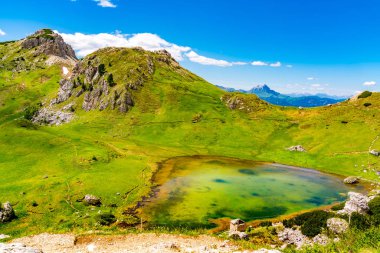 Natural landscape of the Dolomites mountain in summer at The Valparola Pass in Belluno Province Italy clipart