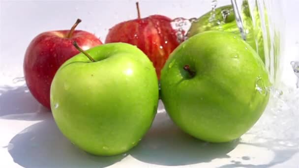 Pouring Fresh Water Green Red Apples Slow Motion — Stock Video