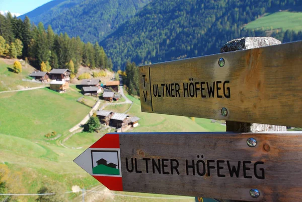 Hiking sign in the Ultental Valley  (German: Ultental or Ulten, Italian: Val d\'Ultimo), South Tyrol, Italy. Translation of \'Ultner Hoefeweg\'  is Ultner Cottages way