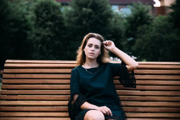 Young Brunette Woman Black Dress Posing Bench — Stock Photo, Image