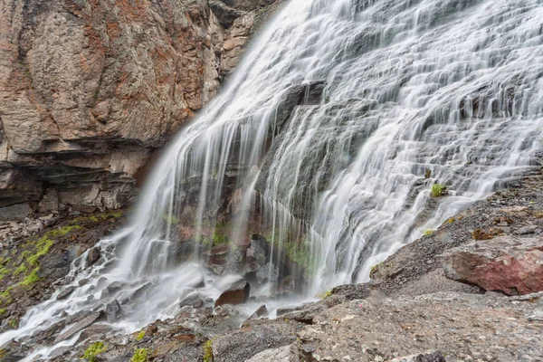 Waterfall in the mountains, landscape. Journey to the mountains. Kyrgyzstan. — Stock Image Waterfall Mountains Landscape Journey Mountains Kyrgyzstan Stock Photo