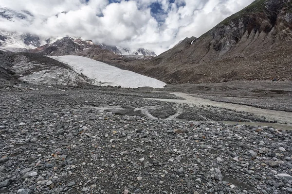 Mountain landscape, snow and rocks. Nature of Kyrgyzstan.