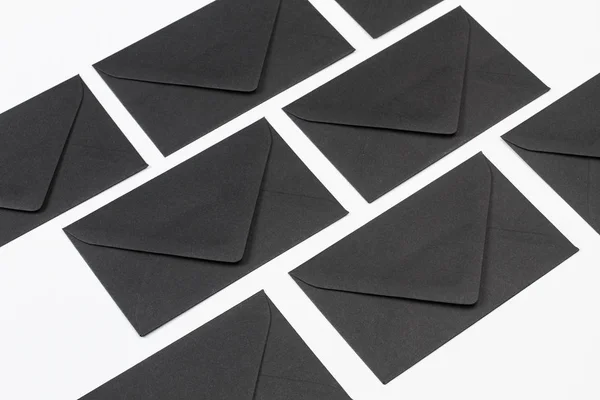 Black envelopes in a close up view