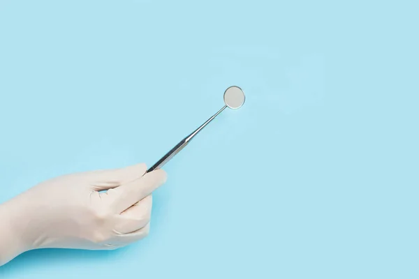 Dentist Mirror Dentist Hand Medical Gloves Light Blue Background — Stock Photo, Image