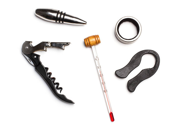 Corkscrew and wine accessories on a white background