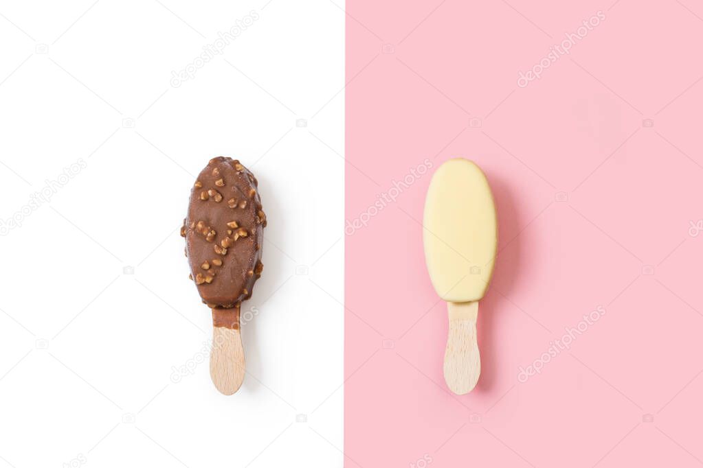 A white chocolate dipped ice lolly on a pink background and a chocolate dipped ice lolly with peanuts chips on a white background