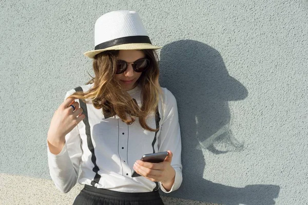 Outdoor Portrait Teenage Girl Hat Girl Uses Smartphone Reads Writes — Stock Photo, Image