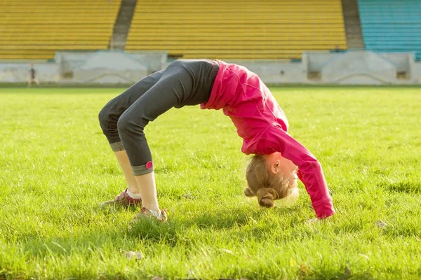 Sportive Little Girl Standing Upside Green Grass Stadium Healthy Lifestyle — Stock Photo, Image