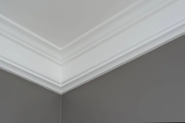 Details in the interior close-up. Ceiling moldings, part of intricate corner — Stock Image Details Interior Close Ceiling Moldings Part Intricate Corner Stock Photo