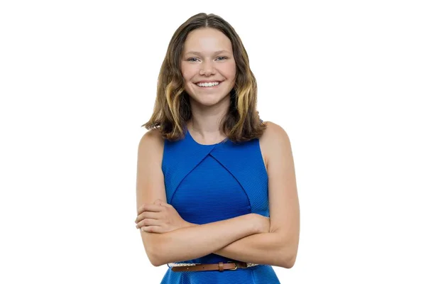 Confident happy beautiful young teenager girl with arms crossed smiling on white background, isolated — Stock Photo, Image