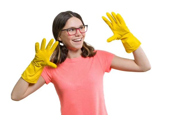 Young smiling cheerful girl in yellow rubber protective gloves, white isolated background — Stock Photo, Image