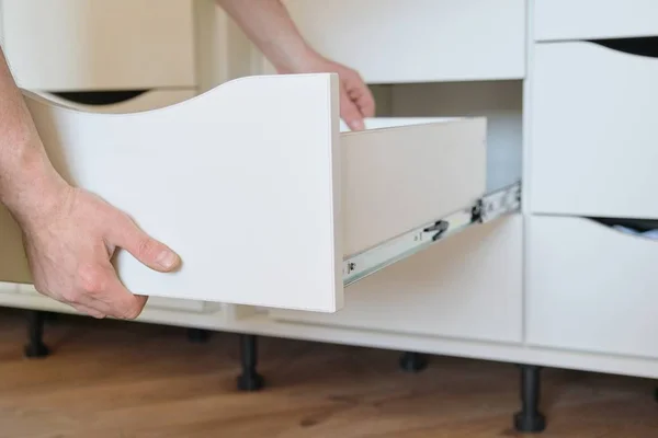 Installation of furniture. Closeup of workers hand and furniture details — Stock Image Installation of furniture. Closeup of workers hand and furniture details Stock Picture